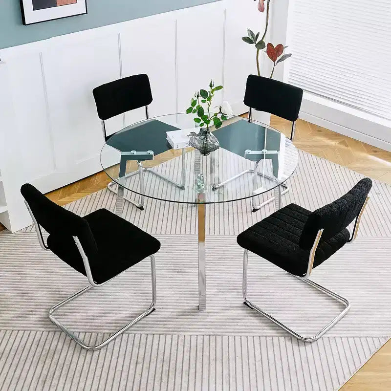 Tavolo da pranzo rotondo moderno di lusso con piano in vetro e gambe in metallo per sala da pranzo