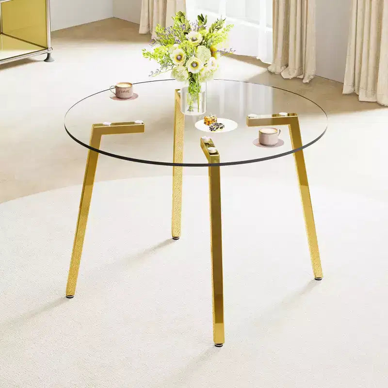 Tavolo da pranzo rotondo moderno di lusso con piano in vetro e gambe in metallo per sala da pranzo