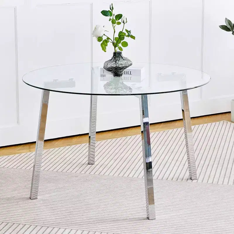 Tavolo da pranzo rotondo moderno di lusso con piano in vetro e gambe in metallo per sala da pranzo